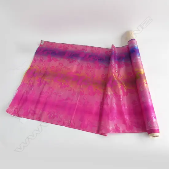 A length of raspberry pink silk jacquard…